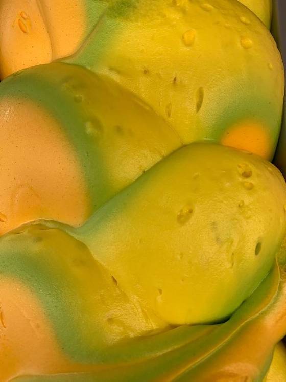 Skittles Rainbow gelato in the cabinet
